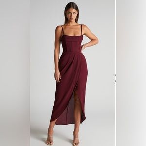 Wine/burgundy colored midi dress with corset style top. Perfect for weddings!